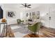 Stylish living room featuring hardwood floors, comfortable furniture, and large windows for natural light at 1350 Bluefield Sw Dr, Atlanta, GA 30310