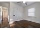 Bedroom showcasing hardwood floors and a neutral color palette, with entry to hallway at 1006 Byron Sw Dr, Atlanta, GA 30310