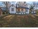 Charming two-story home with a cozy front porch, new landscaping and updated exterior paint at 1006 Byron Sw Dr, Atlanta, GA 30310