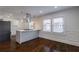 Open kitchen with stainless steel hood and eat in island at 1006 Byron Sw Dr, Atlanta, GA 30310