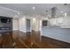 Spacious living room with kitchen and stone fireplace at 1006 Byron Sw Dr, Atlanta, GA 30310