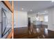 Bright, open-concept room showcasing hardwood floors, stylish finishes, and abundant natural light at 1006 Byron Sw Dr, Atlanta, GA 30310