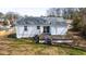 Wide shot of backyard with a wooden deck at 122 Goldie Se Dr, Marietta, GA 30067