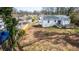 Backyard view showcasing level ground and a newly constructed deck, making it an ideal outdoor living space at 122 Goldie Se Dr, Marietta, GA 30067