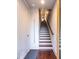 Inviting entryway with staircase and hardwood floors at 131 City View Ne Ct, Atlanta, GA 30308