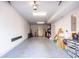 Spacious garage features epoxy floors, ample lighting, and plenty of room for storage and parking at 131 City View Ne Ct, Atlanta, GA 30308