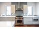 Beautiful kitchen featuring stainless steel appliances, modern cabinets, and tile backsplash at 131 City View Ne Ct, Atlanta, GA 30308