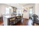 A modern kitchen features an island with bar stool seating and stainless steel appliances at 131 City View Ne Ct, Atlanta, GA 30308