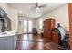 Sunlit home office with hardwood floors, a wet bar, and French doors to an outdoor space at 131 City View Ne Ct, Atlanta, GA 30308