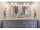 Bathroom featuring a double vanity, marble countertop, updated fixtures, and modern lighting at 1953 Graystone Pkwy, Grayson, GA 30017