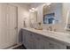 Bathroom featuring a double vanity, marble countertop, updated fixtures, and modern lighting at 1953 Graystone Pkwy, Grayson, GA 30017