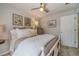 Bright bedroom featuring a comfortable bed, neutral walls, and unique decor at 1953 Graystone Pkwy, Grayson, GA 30017