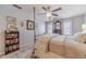 Bedroom with four-poster bed, ceiling fan, and decorative accents create a relaxing atmosphere at 1953 Graystone Pkwy, Grayson, GA 30017