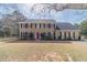 Charming two-story home with black shutters and a welcoming red front door at 1953 Graystone Pkwy, Grayson, GA 30017