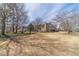 Large yard offers plenty of space and beautiful mature landscaping at 1953 Graystone Pkwy, Grayson, GA 30017