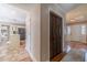 Hallway leading to the front door, kitchen, and laundry area at 1953 Graystone Pkwy, Grayson, GA 30017