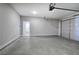 An empty two-car garage showcasing the ample space and access to the home at 203 Daisy Ne Ct, Cartersville, GA 30121