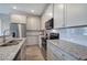 Modern kitchen featuring stainless steel appliances and granite countertops at 203 Daisy Ne Ct, Cartersville, GA 30121