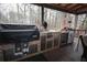 Outdoor kitchen featuring stainless steel appliances, granite countertops, and a beverage fridge at 402 Rising Cir, Woodstock, GA 30189