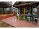 The perfect backyard escape is possible with this tiki bar and cozy outdoor seating at 402 Rising Cir, Woodstock, GA 30189