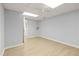 Open basement with a light grey walls, white ceiling and modern flooring creating a functional space at 5020 Puritan Dr, Sugar Hill, GA 30518