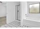 Bathroom featuring a shower and a soaking tub under a window at 11961 Lovejoy Crossing Way, Hampton, GA 30228