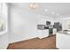 Stylish kitchen with granite countertops, stainless steel appliances, and ample natural light at 11961 Lovejoy Crossing Way, Hampton, GA 30228
