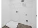 Clean, empty laundry room with hook-ups and tile flooring at 11961 Lovejoy Crossing Way, Hampton, GA 30228