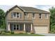 Charming two-story brick home with gray shutters and a covered front porch, perfect for families at 1217 Arnhem Dr, Hampton, GA 30228
