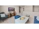 Cozy living room with comfortable seating, modern entertainment center and neutral decor at 1217 Arnhem Dr, Hampton, GA 30228