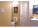 A well-lit bathroom featuring modern fixtures and a decorative mirror enhances its clean and welcoming space at 1537 David Lee St, Acworth, GA 30102