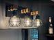 Bathroom lighting above a mirror with three diamond-shaped light fixtures at 1537 David Lee St, Acworth, GA 30102