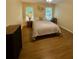 The room has two windows and wood floors at 1537 David Lee St, Acworth, GA 30102