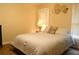 Cozy bedroom featuring a warm color scheme, natural light, and comfortable bedding at 1537 David Lee St, Acworth, GA 30102