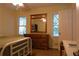 Bedroom featuring natural light, a wooden dresser, and a comfortable bed, all in a cozy setting at 1537 David Lee St, Acworth, GA 30102