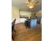 Beautiful kitchen features a gray island, stainless steel appliances, and white cabinets at 1537 David Lee St, Acworth, GA 30102