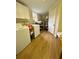 Functional laundry room with washer, dryer, white cabinetry, and vinyl flooring at 1537 David Lee St, Acworth, GA 30102
