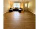 Inviting living area featuring luxury flooring and a comfortable couch, perfect for relaxation at 1537 David Lee St, Acworth, GA 30102