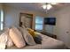 Warm and inviting main bedroom with decorative pillows, a TV, and a large mirror over a dresser at 1537 David Lee St, Acworth, GA 30102