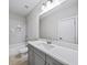 Bathroom featuring a single sink vanity with a shower and bathtub combo at 185 Bellehaven Dr, Woodstock, GA 30188