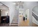 Spacious foyer featuring a staircase, wood flooring, and an open layout at 2524 Columbia Crossing Ct, Decatur, GA 30034