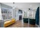 Sun-drenched living room showcases a fireplace, hardwood floors, and access to the back deck at 2524 Columbia Crossing Ct, Decatur, GA 30034