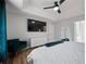 Spacious main bedroom with hardwood floors, a TV, and ensuite bathroom at 2524 Columbia Crossing Ct, Decatur, GA 30034
