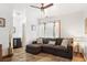 Inviting living room featuring a comfortable sectional sofa, stylish decor, and a well-lit ambiance at 1655 Butler Bridge Rd, Covington, GA 30016
