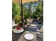 Elegant outdoor dining setup with a beautifully arranged table, perfect for enjoying meals outdoors at 1655 Butler Bridge Rd, Covington, GA 30016