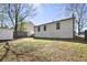 A spacious fenced backyard with a storage shed and partial grass, ready for leisure and entertainment at 2070 Charles Cudd Ct, Lithonia, GA 30058