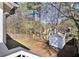 An ample backyard with a shed, partial grass, and fenced perimeter, a great outdoor space at 2070 Charles Cudd Ct, Lithonia, GA 30058