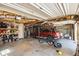 Organized two-car garage featuring ample storage space for vehicles and equipment at 7760 Poppy Dr, Winston, GA 30187