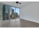 Bedroom with large floor-to-ceiling windows boasting stunning city views at 1080 Peachtree Ne St # 2003, Atlanta, GA 30309