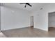 Bright bedroom with ceiling fan, walk-in closet, and contemporary flooring at 1080 Peachtree Ne St # 2003, Atlanta, GA 30309
